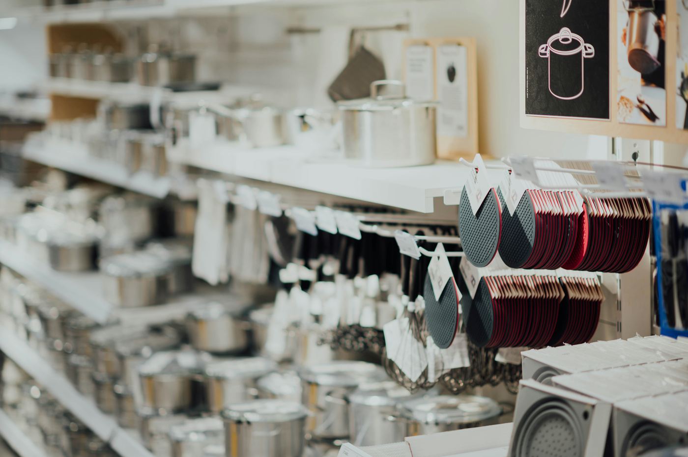 Kitchenware and cookware arranged on a retail shelf